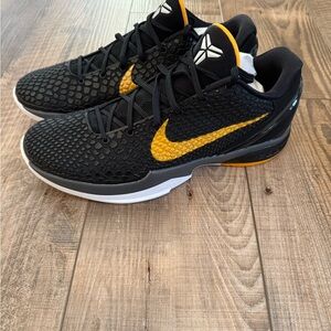 Nike Black and Gold Athletic Shoes